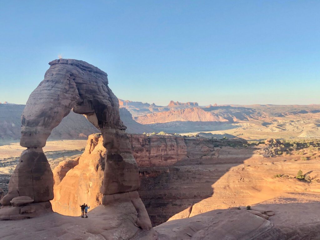 Lori and Steve Standing under Delicate Arch