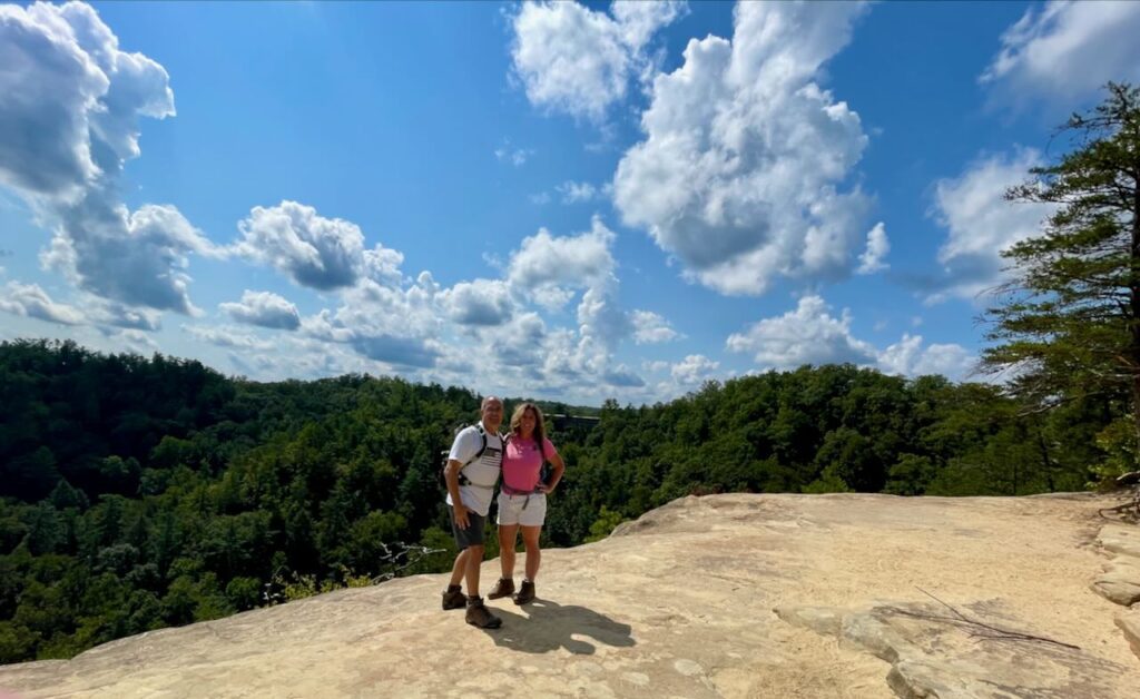 Lori and Steve posing for a picture at Look out Point on the Natural Bridge State Park hike.